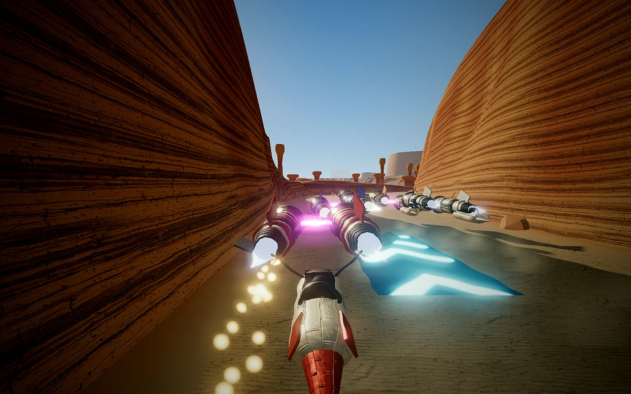 Hover racer boosting through a striped sandstone canyon, trailing sparks past a glowing boost pad